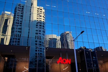 An office building with Aon logo is seen amidst the easing of the coronavirus disease (COVID-19) restrictions in the Central Business District of Sydney, Australia, June 3, 2020.