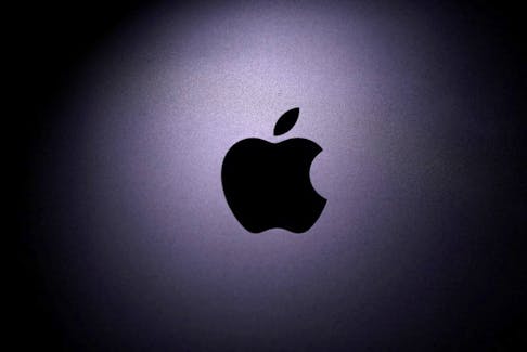 Apple logo is seen on the MacBook in this illustration taken taken April 12, 2020.