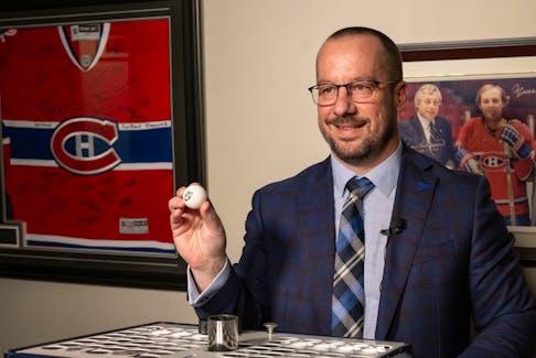 Martin Lavallée, assistant commissioner of the Quebec Maritimes Junior Hockey League, holds the winning lottery ball with the Cape Breton Eagles logo on it during the league’s draft lottery on Thursday night. The Eagles won the lottery and will pick first overall at the 2024 QMJHL Entry Draft in June in Moncton. CONTRIBUTED/VINCENT ETHIER, QMJHL
