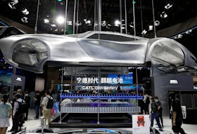 People visit the booth of battery manufacturer CATL, at the Beijing International Automotive Exhibition, or Auto China 2024, in Beijing, China, April 25, 2024.