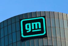 The GM logo is seen on the facade of the General Motors headquarters in Detroit, Michigan, U.S., March 16, 2021. 