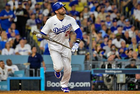 Oct 9, 2023; Los Angeles, California, USA; Los Angeles Dodgers designated hitter J.D. Martinez (28) hits a home run against the Arizona Diamondbacks during the fourth inning for game two of the NLDS for the 2023 MLB playoffs at Dodger Stadium. Mandatory Credit: Jayne Kamin-Oncea-USA TODAY Sports/File Photo