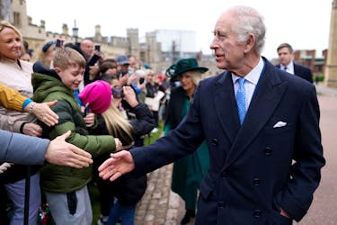 Britain's King Charles and Queen Camilla greet people after attending the Easter Matins Service at St. George's Chapel, Windsor Castle, Britain March 31, 2024.