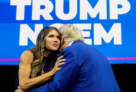 South Dakota Governor Kristi Noem greets former U.S. President and Republican presidential candidate Donald Trump before he speaks at a South Dakota Republican party rally in Rapid City, South Dakota, U.S. September 8, 2023.