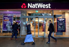People walk past a Natwest Bank branch in central London, Britain November 22, 2023.