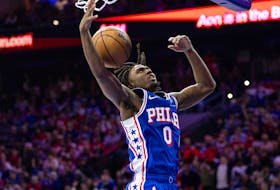 Apr 25, 2024; Philadelphia, Pennsylvania, USA; Philadelphia 76ers guard Tyrese Maxey (0) dunks the ball against the New York Knicks during the second half of game three of the first round for the 2024 NBA playoffs at Wells Fargo Center. Mandatory Credit: Bill Streicher-USA TODAY Sports