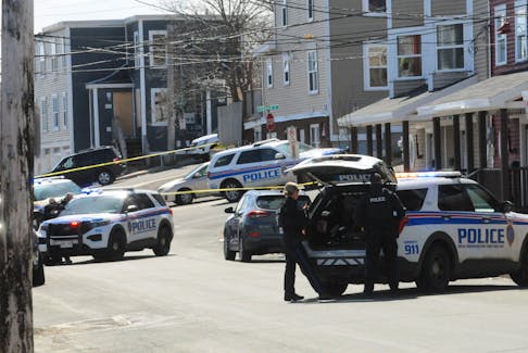 RNC officers at the scene of a person barricaded in a house on Livingstone Street in St. John’s on Friday afternoon. JOE GIBBONS • THE TELEGRAM