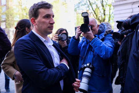 Christopher Cash, 29, who has been charged with spying for China, arrives at Westminster Magistrates' Court, in London, Britain, April 26, 2024.