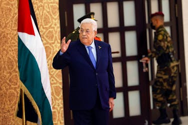 Palestinian President Mahmoud Abbas gestures, as he attends a swearing-in ceremony for the newly formed cabinet, in Ramallah, in the Israeli-occupied West Bank, March 31, 2024.