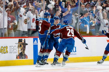 Apr 26, 2024; Denver, Colorado, USA; Colorado Avalanche right wing Valeri Nichushkin (13) celebrates his goal with defenseman Cale Makar (8) and center Nathan MacKinnon (29) in the third period against the Winnipeg Jets in game three of the first round of the 2024 Stanley Cup Playoffs at Ball Arena. Mandatory Credit: Isaiah J. Downing-USA TODAY Sports
