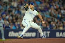 Apr 27, 2024; Toronto, Ontario, CAN; Toronto Blue Jays starting pitcher Yusei Kikuchi (16) pitches to the Los Angeles Dodgers during the second inning at Rogers Centre. Mandatory Credit: John E. Sokolowski-USA TODAY Sports