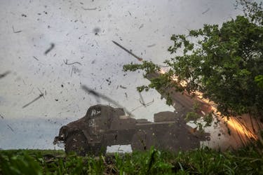 Ukrainian servicemen of the 25th Separate Airborne Brigade of the Armed Forces of Ukraine, fire a BM-21 Grad multiple launch rocket system towards Russian troops near a front line, amid Russia's attack on Ukraine, in Donetsk region, Ukraine April 24, 2024.
