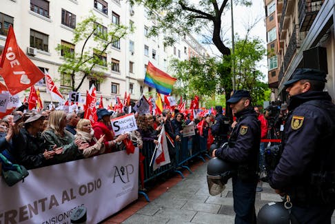 People gather outside Spain's Socialist Party (PSOE) headquarters to show support for the Secretary General of PSOE and Prime Minister Pedro Sanchez, in Madrid, Spain April 27, 2024.
