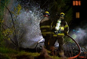 Firefighters made quick work of a Saturday night St. John's shed fire but two homes were damaged during the incident. Keith Gosse/The Telegram