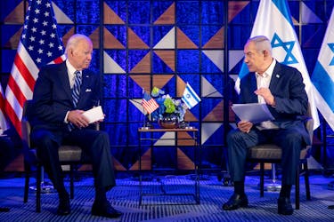 U.S. President Joe Biden, left, meets with Israeli Prime Minister Benjamin Netanyahu, right, to discuss the ongoing conflict between Israel and Hamas, in Tel Aviv, Israel, Wednesday, Oct. 18, 2023. Miriam Alster/Pool via