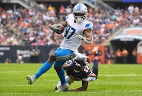 Oct 3, 2021; Chicago, Illinois, USA; Detroit Lions wide receiver Quintez Cephus (87) runs for a first down in the second half against Chicago Bears cornerback Kindle Vildor (22) at Soldier Field. Mandatory Credit: Quinn Harris-USA TODAY Sports/ File Photo