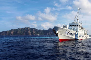 Japan Coast Guard vessel PS206 Houou sails in front of Uotsuri island, one of the disputed islands, called Senkaku in Japan and Diaoyu in China, in the East China Sea August 18, 2013.