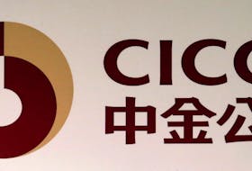 The company logo of China International Capital Corporation Ltd (CICC), China’s first joint venture investment bank, is displayed at a news conference at the company's annual results in Hong Kong on March 30, 2016.