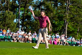 Apr 14, 2024; Augusta, Georgia, USA; Cameron Smith acknowledges the gallery after finishing on No. 18 during the final round of the Masters Tournament. Mandatory Credit: Rob Schumacher-USA TODAY Network/File photo