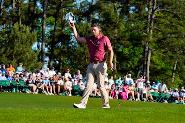 Apr 14, 2024; Augusta, Georgia, USA; Cameron Smith acknowledges the gallery after finishing on No. 18 during the final round of the Masters Tournament. Mandatory Credit: Rob Schumacher-USA TODAY Network/File photo