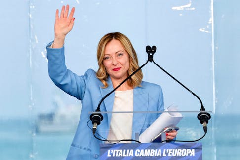 Italy's Prime Minister Giorgia Meloni gestures at a "Brothers of Italy" (Fratelli d'Italia) right-wing party conference in Pescara, Italy, April 28, 2024.