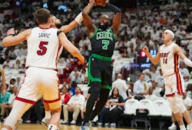 Apr 27, 2024; Miami, Florida, USA; Boston Celtics guard Jaylen Brown (7) looks to pass the ball against the Miami Heat in the first half during game three of the first round for the 2024 NBA playoffs at Kaseya Center. Mandatory Credit: Jim Rassol-USA TODAY Sports