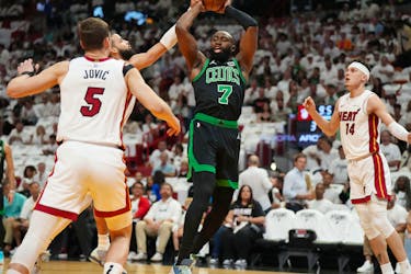 Apr 27, 2024; Miami, Florida, USA; Boston Celtics guard Jaylen Brown (7) looks to pass the ball against the Miami Heat in the first half during game three of the first round for the 2024 NBA playoffs at Kaseya Center. Mandatory Credit: Jim Rassol-USA TODAY Sports