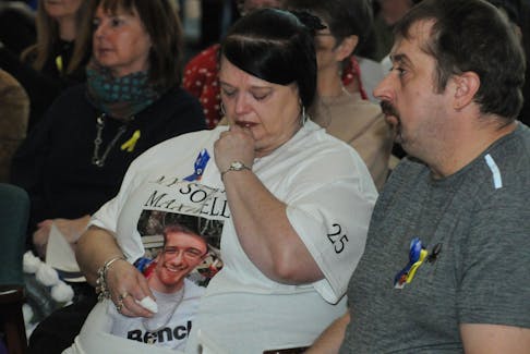 The mother of Maxwell Canning, 25, who was killed in a company vehicle workplace accident and fire on June 28, 2022 on the Hodgewater Line, displays her emotions at the Day of Mourning ceremony held at the main lobby of the Confederation Building on Sunday afternoon, April 28, 2024. -Photo by Joe Gibbons/The Telegram