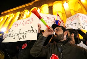 Opposition supporters take part in a rally to protest against the government and demand an early parliamentary election in Tbilisi, Georgia November 25, 2019.