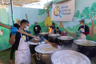 Members of "World Central Kitchen" prepare food for Palestinians, in the location given as Gaza, amid the ongoing conflict between Israel and Hamas,  in this picture released on March 21, 2024 and obtained from social media. Courtesy of @chefjoseandres via X/via REUTERS /File Photo