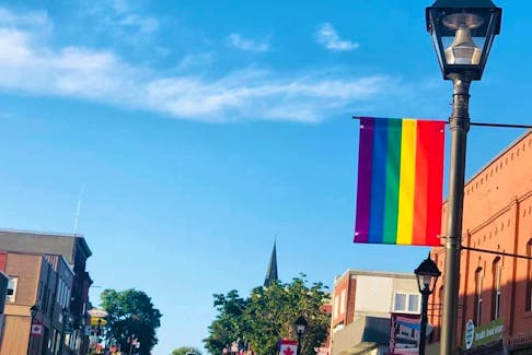 A new town policy no longer allows Pride banners on light poles in downtown Woodstock.