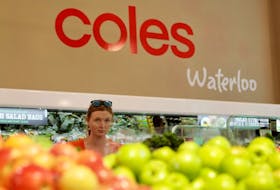 A woman walks in the fruit and vegetables section at a Coles supermarket in Sydney, Australia, February 20, 2018. Picture taken February 20, 2018.