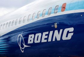 The Boeing logo is seen on the side of a Boeing 737 MAX at the Farnborough International Airshow, in Farnborough, Britain, July 20, 2022. 