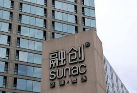 File photo: The logo of property developer Sunac is seen outside a residential compound in Beijing, China September 19, 2023.