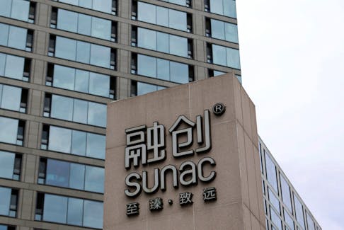 File photo: The logo of property developer Sunac is seen outside a residential compound in Beijing, China September 19, 2023.