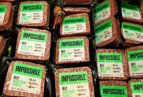 Impossible Foods plant-based beef products seen inside a refrigerator at the meat section of a chain supermarket in Hong Kong, China, October 20, 2020.