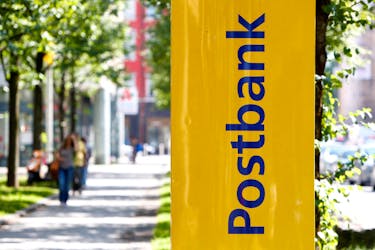 A Postbank sign is seen in Munich, Germany, August 1, 2017.