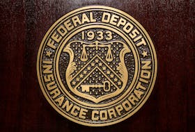 The Federal Deposit Insurance Corp (FDIC) logo is seen at the FDIC headquarters in Washington, 2011. 