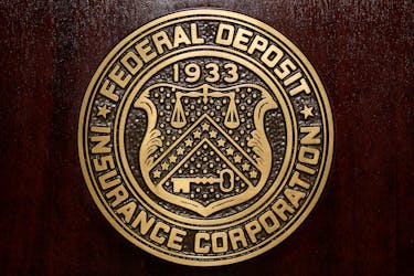 The Federal Deposit Insurance Corp (FDIC) logo is seen at the FDIC headquarters in Washington, 2011. 