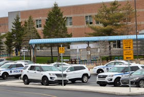 Halifax regional police are seen parked in front of Halifax West High School in Halifax Monday April 29, 2024.

TIM KROCHAK PHOTO