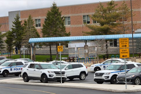 Halifax regional police are seen parked in front of Halifax West High School in Halifax Monday April 29, 2024.

TIM KROCHAK PHOTO