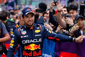 Formula One F1 - Chinese Grand Prix - Shanghai International Circuit, Shanghai, China - April 21, 2024 Red Bull's Sergio Perez celebrates after finishing third place in the Chinese Grand Prix