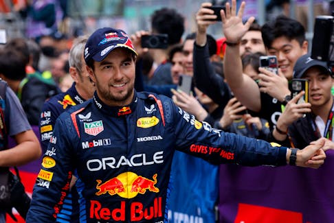 Formula One F1 - Chinese Grand Prix - Shanghai International Circuit, Shanghai, China - April 21, 2024 Red Bull's Sergio Perez celebrates after finishing third place in the Chinese Grand Prix