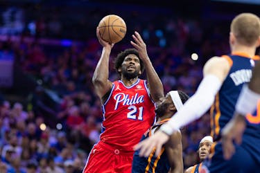Apr 28, 2024; Philadelphia, Pennsylvania, USA; Philadelphia 76ers center Joel Embiid (21) drives for a shot against New York Knicks forward Precious Achiuwa (5) during the first half of game four of the first round in the 2024 NBA playoffs at Wells Fargo Center. Mandatory Credit: Bill Streicher-USA TODAY Sports