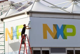 A man works on a tent for NXP Semiconductors in preparation for the 2015 International Consumer Electronics Show (CES) at Las Vegas Convention Center in Las Vegas, Nevada, U.S. on January 4, 2015.  