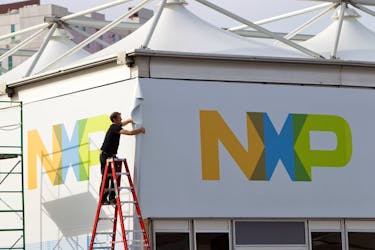A man works on a tent for NXP Semiconductors in preparation for the 2015 International Consumer Electronics Show (CES) at Las Vegas Convention Center in Las Vegas, Nevada, U.S. on January 4, 2015.  