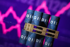 Miniatures of oil barrels and a rising stock graph are seen in this illustration taken January 15, 2024.