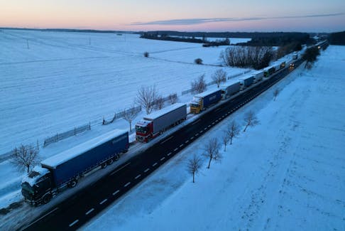 Trucks line up in a long queue to cross the Polish-Ukrainian border at the Hrebenne-Rawa Ruska crossing in Potoki, Poland, January 8, 2024.