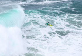 German big wave surfer Sebastian Steudtner rides a wave in Praia do Norte, Nazare, Portugal. January 22, 2024.
