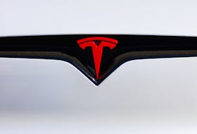 A logo is pictured on an electric car at the Tesla Inc. vehicle facility in Costa Mesa, California, U.S., November 1, 2023.    